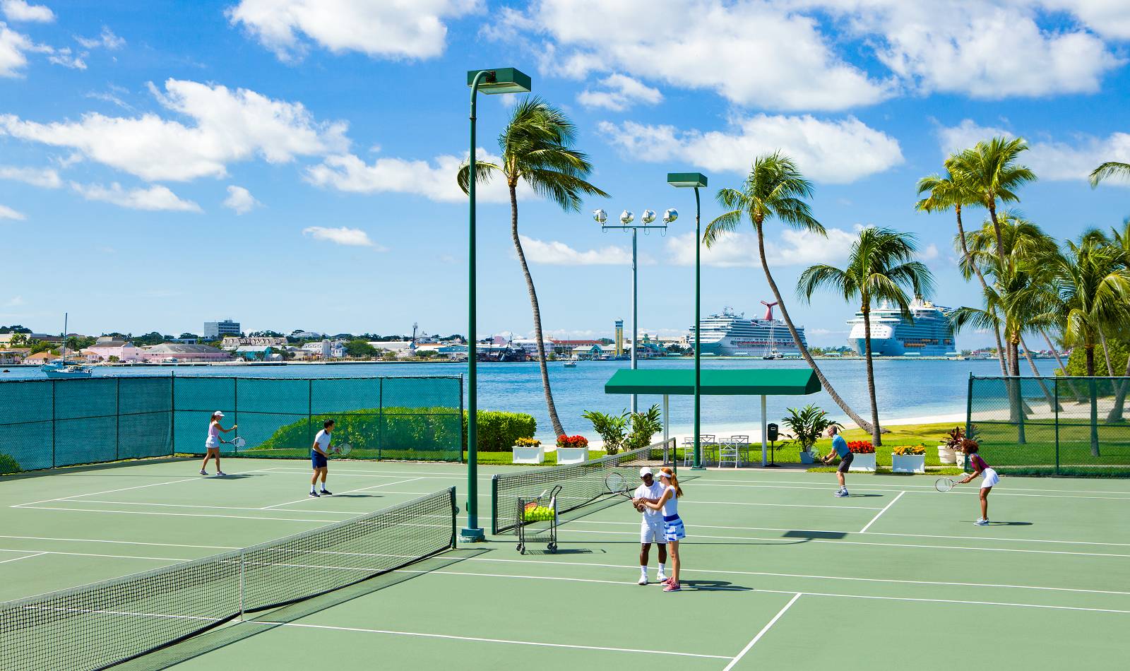 atlantis tennis center guests playing