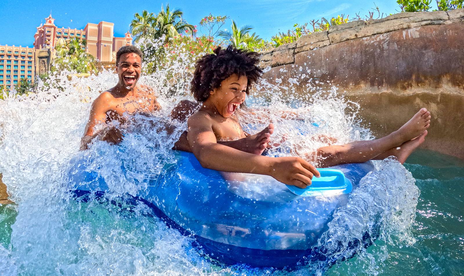 atlantis aquaventure rapids river father dad son family tubing